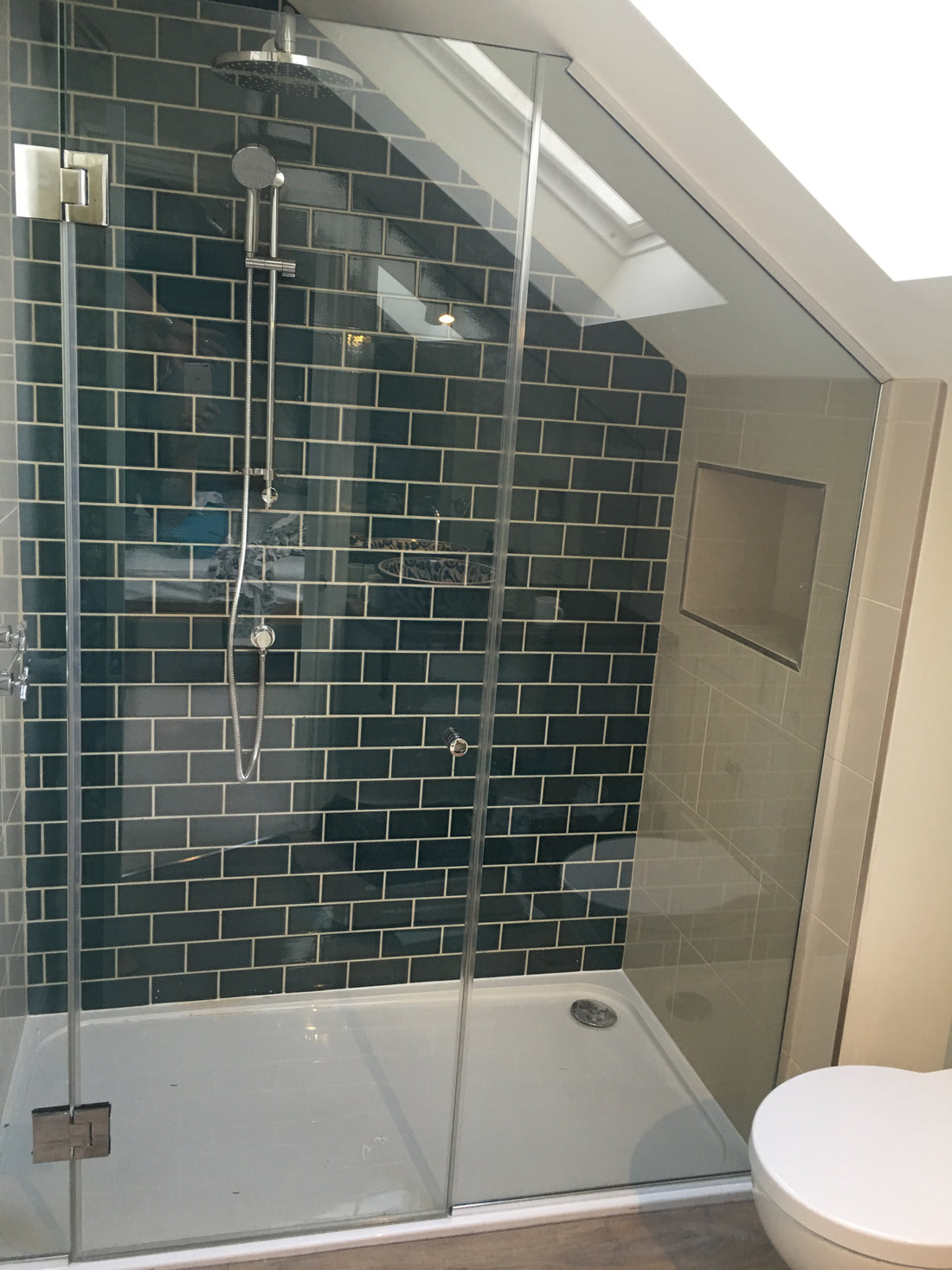 Three panel configuration for glass shower enclosure